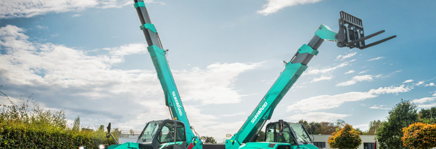 Sunward SWTH 4014 telehandler next to the SWTH 4018, booms raised and stabilisers deployed