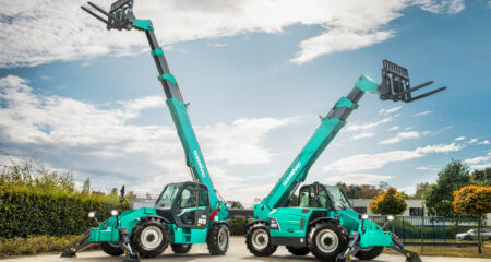 Sunward SWTH 4014 telehandler next to the SWTH 4018, booms raised and stabilisers deployed